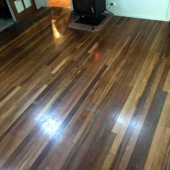 before - lounge wooden floor restoration